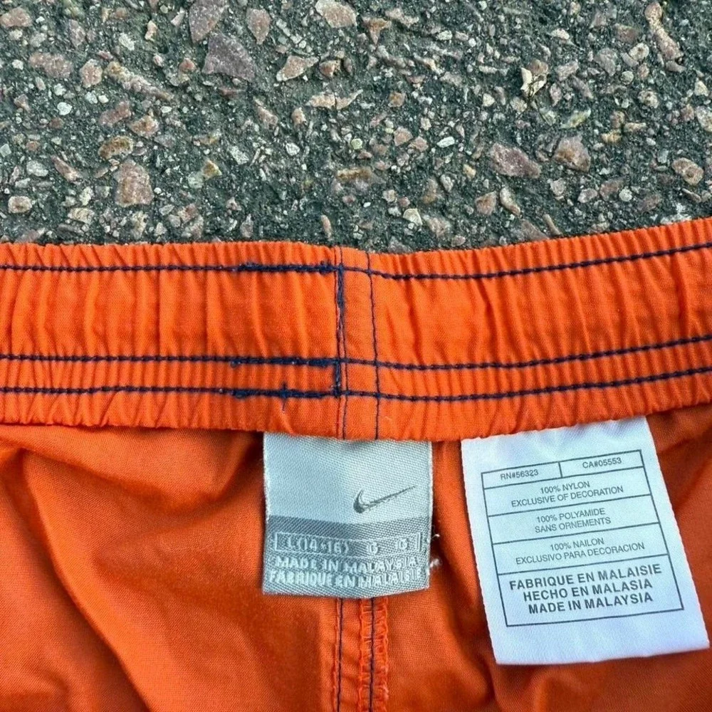 Vintage Nike orange and blue shorts Size L‎